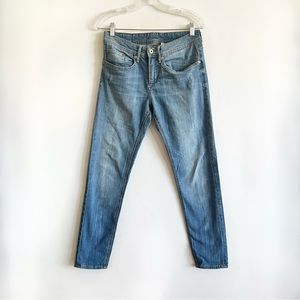 Mid Rise Tapered Distressed Slim Jeans